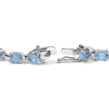 Load image into Gallery viewer, .925 Sterling Silver 11.0 Cttw Oval Shaped Created Light Blue Topaz Link Bracelet - 7 inch