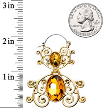 Load image into Gallery viewer, Yellow Gem Gold Tone Double Scrolling Tunnel Plug Earrings
