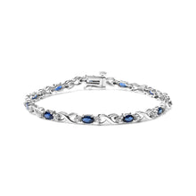 Load image into Gallery viewer, 10K White Gold 5x4mm Oval Sapphire Gemstone and 1/10 Cttw Diamond Prong Set "X" Link Bracelet - Size 7" (H-I Color, SI1-SI2 Clarity)