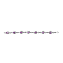 Load image into Gallery viewer, .925 Sterling Silver 1/10 Cttw Natural Round Diamond and 7X5MM Oval Amethyst Cross Tennis Bracelet (I-J Color, I1-I2 Clarity) - 7"