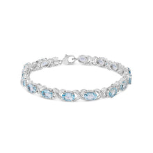 Load image into Gallery viewer, .925 Sterling Silver 16.0 Cttw Oval Blue Topaz and Diamond Accent Tennis X Link Bracelet (I-J Color, I1-I2 Clarity) - Size 7" Inch