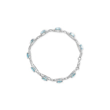Load image into Gallery viewer, .925 Sterling Silver 7x7 mm Cushion Cut Blue Topaz and 1/20 cttw Round Cut Diamond Fashion Tennis Bracelet (I-J Color, I1-I2 Clarity) - 7"