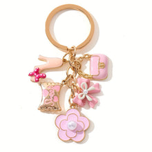 Load image into Gallery viewer, A Cute And Compact Pink Bag with a Heart-Shaped Oil Drop Keychain, Perfect As a Mini Decorative Accessory Or Gift for Cosmetics