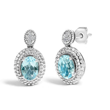 Load image into Gallery viewer, .925 Sterling Silver Diamond Accent and Oval Blue Topaz with Beaded Halo Drop Stud Earrings (I-J color, I1-I2 Clarity)