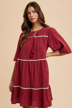 Load image into Gallery viewer, Tassel Contrast Trim Tie Neck Half Sleeve Tiered Dress – Bohemian-Inspired Dress with Tassel Details, Adjustable Tie Neck, and Tiered Design for a Flowing, Feminine Silhouette