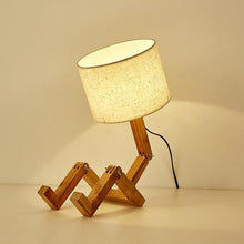 Load image into Gallery viewer, New Modern Luxury and Retro STEVVEX Wood Robot Shape Folding Table Lamp Creative European Fashion Bedroom Study Bedroom Bedside Linen Lamp Shade Table Lamp
