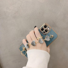 Load image into Gallery viewer, Luxury Women Silicone Phone Case Cover With Wrist Chain Bracelet for iPhone Wristband Bracelet Hand Holder Cover for iPhone 13 12 11 Pro Max plating Case Heart Chain Cases for iPhone 7 8 Plus XR XS Max X