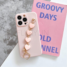 Load image into Gallery viewer, Soft Silicone Love Heart Chain Luxury Soft Flexible with Love Heart Chain Bracelet Hand Strap Girly Women Protective Cover for iPhone Wrist Bracelet Phone Case For iPhone 12 13 14 Pro Max Mini 11 Pro Max X XS Max XR 7 8 Plus