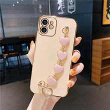 Load image into Gallery viewer, Luxury Women Silicone Phone Case Cover With Wrist Chain Bracelet for iPhone Wristband Bracelet Hand Holder Cover for iPhone 13 12 11 Pro Max plating Case Heart Chain Cases for iPhone 7 8 Plus XR XS Max X