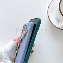 Load image into Gallery viewer, Soft Silicone Love Heart Chain Luxury Soft Flexible with Love Heart Chain Bracelet Hand Strap Girly Women Protective Cover for iPhone Wrist Bracelet Phone Case For iPhone 12 13 14 Pro Max Mini 11 Pro Max X XS Max XR 7 8 Plus