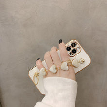 Load image into Gallery viewer, Luxury Women Silicone Phone Case Cover With Wrist Chain Bracelet for iPhone Wristband Bracelet Hand Holder Cover for iPhone 13 12 11 Pro Max plating Case Heart Chain Cases for iPhone 7 8 Plus XR XS Max X