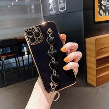 Load image into Gallery viewer, Luxury Women Silicone Phone Case Cover With Wrist Chain Bracelet for iPhone Wristband Bracelet Hand Holder Cover for iPhone 13 12 11 Pro Max plating Case Heart Chain Cases for iPhone 7 8 Plus XR XS Max X