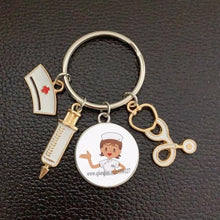 Load image into Gallery viewer, Creative Doctor Keychain Unique Personality Syringe Stethoscope Pendant Keychain Cartoon Colorful Handbag Pendant Keychain Doctor Injection Stethoscope Picture Keychain Round Dome Pendant Women Alloy Keychain