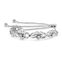 Load image into Gallery viewer, .925 Sterling Silver Diamond Accent Interlocking Infinity and Heart 4â€-10â€ Adjustable Bolo Tennis Bolo Bracelet (H-I Color, I2-I3 Clarity)
