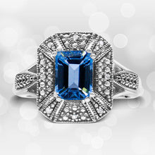 Load image into Gallery viewer, .925 Sterling Silver Diamond Accent and 8X6 mm Emerald-Shape Blue Topaz Ring (I-J Color, I2-I3 Clarity) - Ring Size 7
