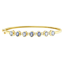 Load image into Gallery viewer, 14K Yellow Gold Alternating Bezel Set 5MM Oval Shaped Tanzanite and 1/5 Cttw Diamond Bangle Bracelet (H-I Color, VS2-SI1 Clarity) - Fit's wrists up to 7.25" Inches
