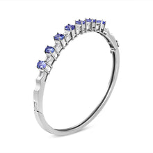 Load image into Gallery viewer, 14K White Gold 5 MM Oval Blue Tanzanite and 1/4 Cttw Diamond Bangle (H-I Color, VS2-SI1 Clarity) - Fits wrists up to 7 1/2 Inches

