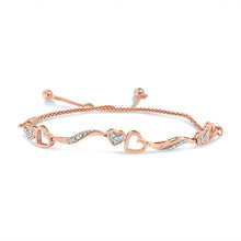 Load image into Gallery viewer, 14K Rose Gold Plated .925 Sterling Silver 1/10 Cttw Diamond Wave and Hearts 4â€-10â€ Adjustable Bolo Bracelet (I-J Color, I3 Clarity)
