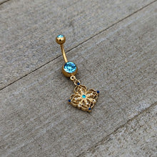 Load image into Gallery viewer, Blue Gem Gold Tone Texture Emblem Dangle Belly Ring
