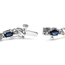 Load image into Gallery viewer, 10K White Gold 5x4mm Oval Sapphire Gemstone and 1/10 Cttw Diamond Prong Set "X" Link Bracelet - Size 7" (H-I Color, SI1-SI2 Clarity)
