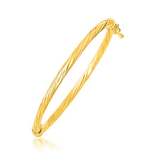 Load image into Gallery viewer, 14k Yellow Gold Children's Bangle with Spiral Motif Style
