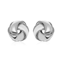 Load image into Gallery viewer, Textured and Polished Love Knot Earrings in Sterling Silver
