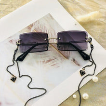 Load image into Gallery viewer, Fashion Rimless  Women Trendy Small Rectangle Sunglasses With High Quality metal frame And UV400 Protection
