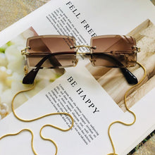 Load image into Gallery viewer, Fashion Rimless  Women Trendy Small Rectangle Sunglasses With High Quality metal frame And UV400 Protection
