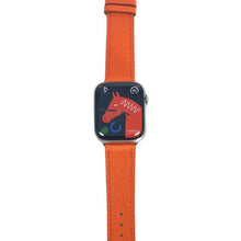 Load image into Gallery viewer, Hermes Apple Watch Series 7 GPS/ Cellular 45 mm - Stainless Steel Case - Orange Faux Leather Watch Band
