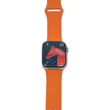 Load image into Gallery viewer, Hermes Apple Watch Series 7 GPS/ Cellular 45 mm - Stainless Steel - Orange Silicone Watch Band

