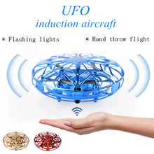 Load image into Gallery viewer, Mini UFO Drone Helicopter Aircraft Hand Controlled Color Light Infrared Quadcopter Induction Kids Flying Saucer Flying Ball Toy
