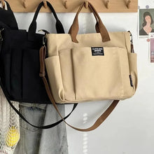 Load image into Gallery viewer, Urban Minimalist Female Student Large Capacity Commuting Horizontal Canvas Single Shoulder Diagonal Cross Portable Tote Bag

