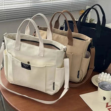 Load image into Gallery viewer, Urban Minimalist Female Student Large Capacity Commuting Horizontal Canvas Single Shoulder Diagonal Cross Portable Tote Bag
