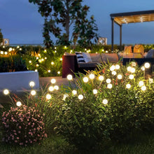 Load image into Gallery viewer, 8 LED Solar Firefly Garden Lights – Waterproof Warm White Outdoor Pathway &amp; Patio Decoration
