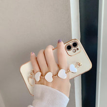 Load image into Gallery viewer, Luxury Women Silicone Phone Case Cover With Wrist Chain Bracelet for iPhone  Wristband Bracelet Hand Holder Cover for iPhone 13 12 11 Pro Max plating Case Heart Chain Cases for iPhone 7 8 Plus XR XS Max X
