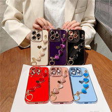 Load image into Gallery viewer, Luxury Mini Heart Shaped Love Bracelet Strap Phone Case Case with Chain Luxury Sparkle Love-Hearts Case with Strap Bracelet Slim Soft Protective Girly Cover For iPhone 11 12 13 14 Pro Max X XR XS Nice Heart Frame On 7 8 Plus SE Chain Phone Cover
