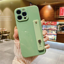 Load image into Gallery viewer, Adjustable Wrist Strap Stand Holder Case with Camera Protection Cute Solid Color Silicone Phone Case Phone Case For iPhone 13 14 Pro Max 12 11 XS Max XR 7 8 Plus 13Pro Soft Silicone Candy Color Back Cover
