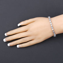 Load image into Gallery viewer, 7.64 Carat Genuine Blue Topaz and White Diamond .925 Sterling Silver Bracelet

