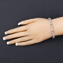 Load image into Gallery viewer, 11.10 Carat Genuine Blue Topaz and White Diamond .925 Sterling Silver Bracelet
