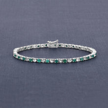 Load image into Gallery viewer, 5.77 Carat Genuine Emerald and White Topaz .925 Sterling Silver Bracelet
