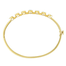 Load image into Gallery viewer, 14K Yellow Gold Alternating Bezel Set 5MM Oval Shaped Tanzanite and 1/5 Cttw Diamond Bangle Bracelet (H-I Color, VS2-SI1 Clarity) - Fit's wrists up to 7.25" Inches
