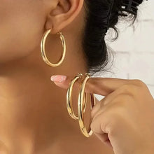 Load image into Gallery viewer, Elegant, Trendy and Shiny Gold Hoop Earrings
