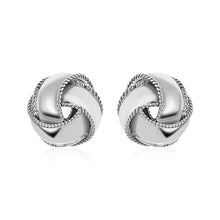 Load image into Gallery viewer, Textured and Polished Love Knot Earrings in Sterling Silver
