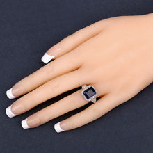 Load image into Gallery viewer, 4.80 Carat Glass Filled Sapphire and White Topaz .925 Sterling Silver Ring
