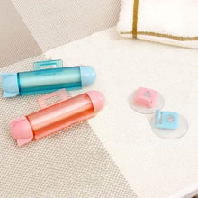 Load image into Gallery viewer, Toothpaste Squeezer Rolling Dispenser
